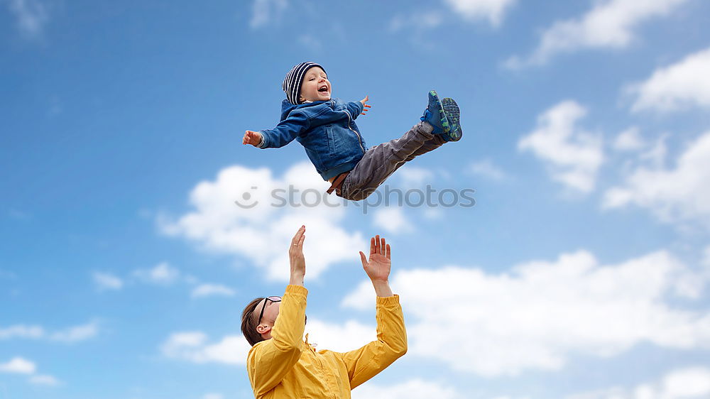 Similar – Image, Stock Photo Father and son playing in the park at the day time. Concept of friendly family. Picture made on the background of blue sky.