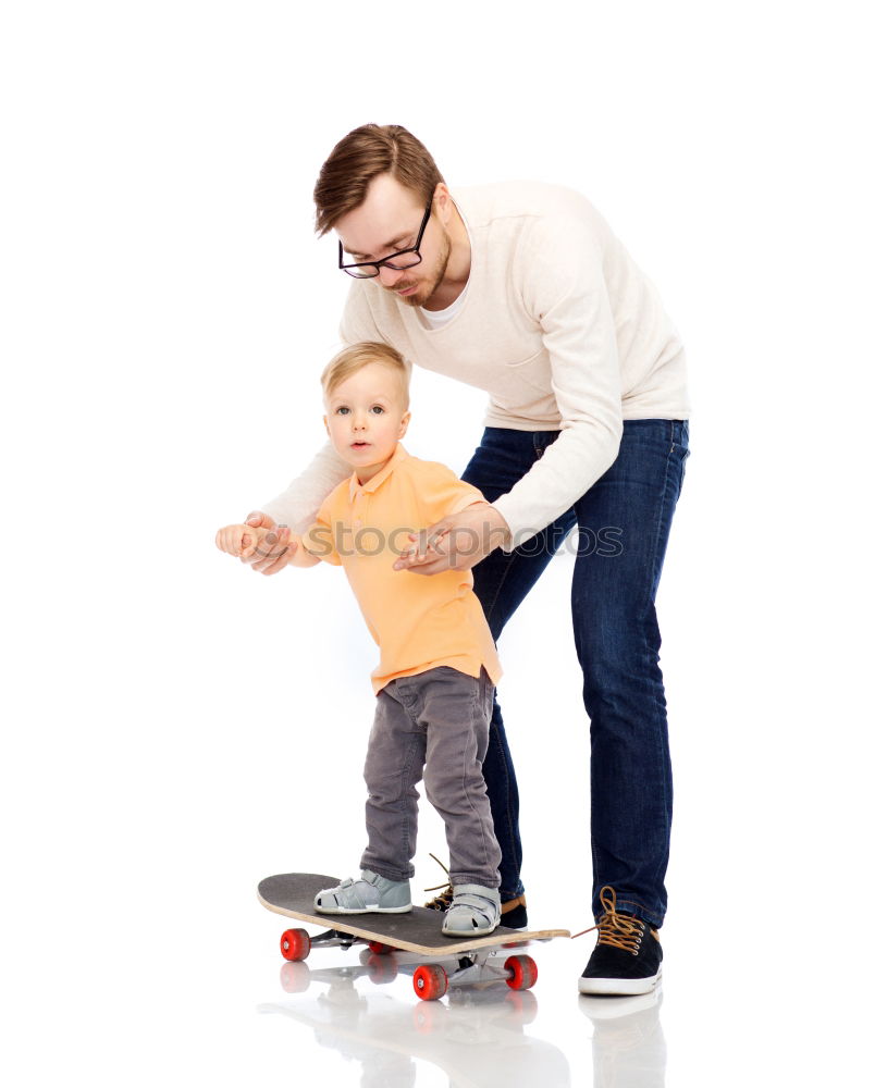 Similar – Image, Stock Photo Father and son playing on the road at the day time. People having fun outdoors. Concept of friendly family.