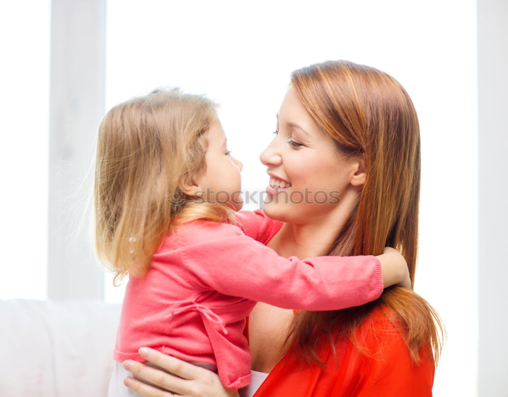 Similar – Image, Stock Photo Beautiful mother and daughter touching each other with their noses. Lovely family portrait