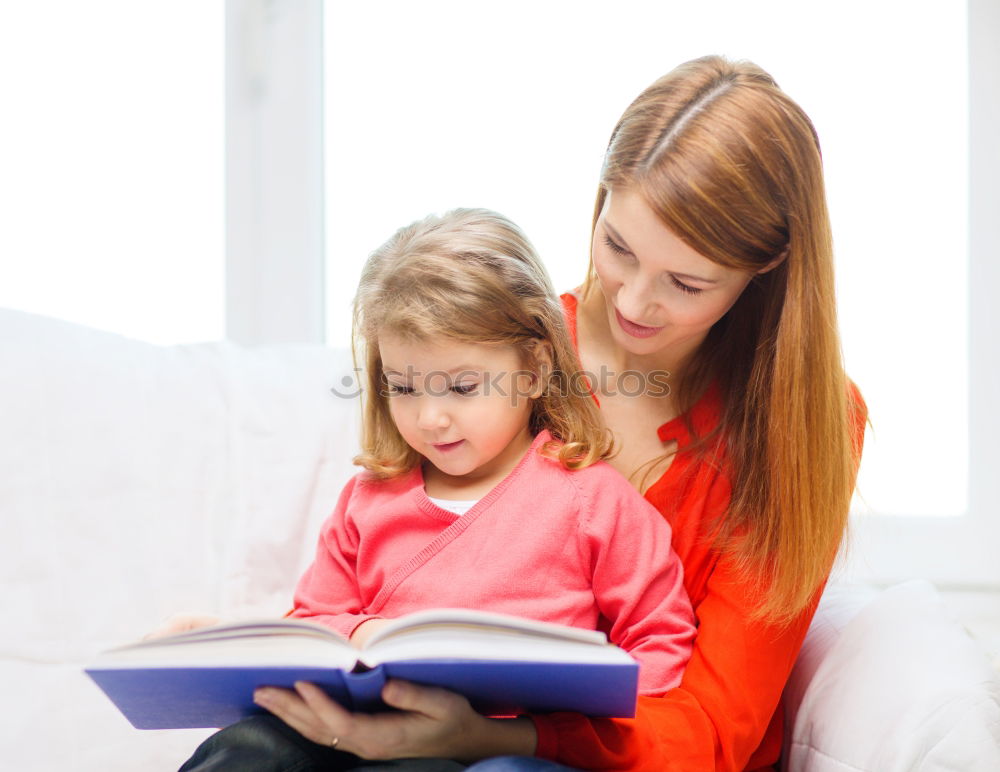 Similar – happy mother and toddler son using tablet