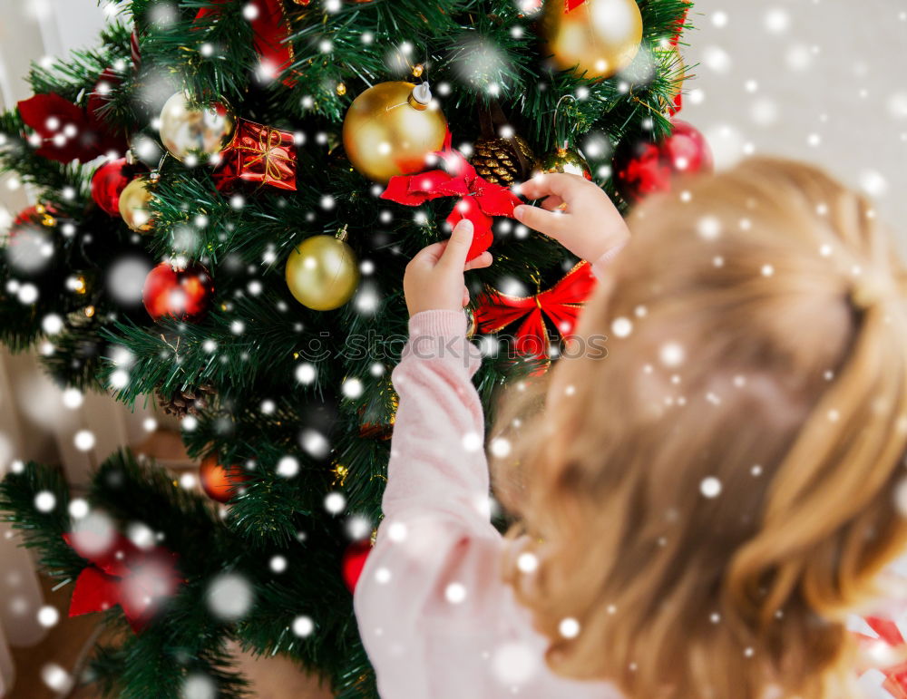 Similar – Christmas decorations over a swing in a park