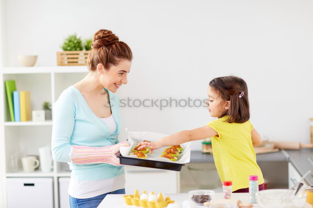 Similar – Image, Stock Photo little african girl is helping her mum preparing cupcake dough