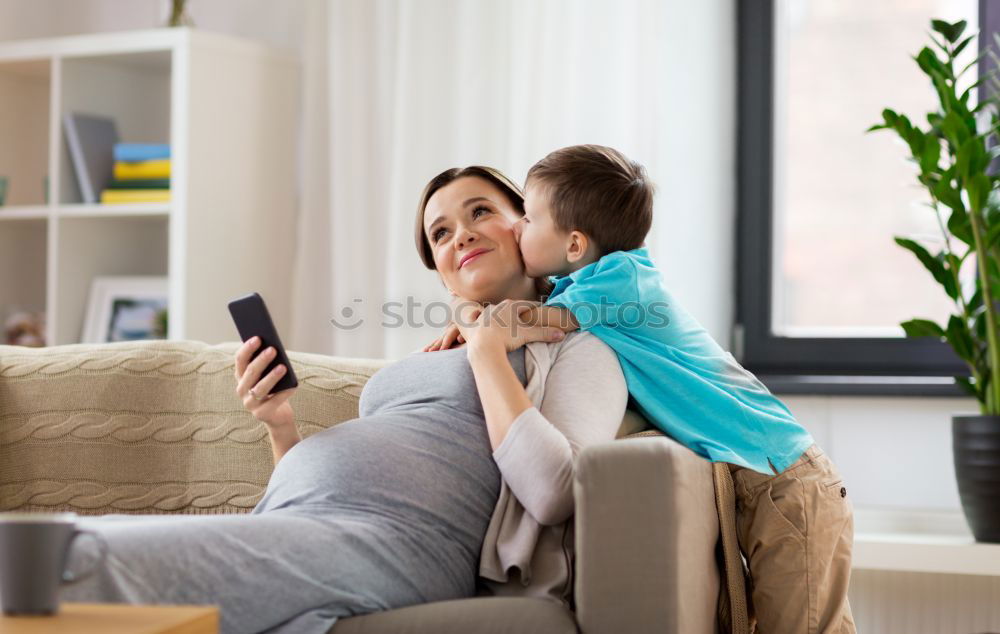 Similar – Mother breastfeed baby while playing with smartphone