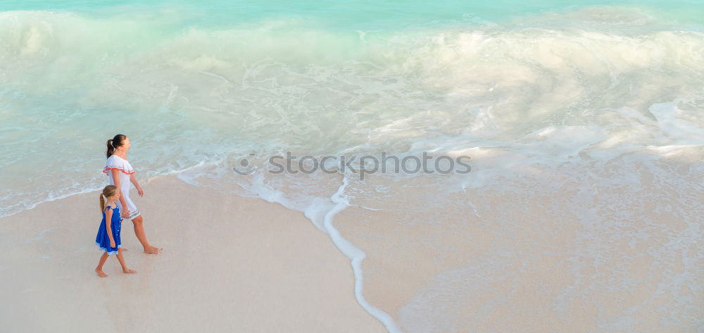 Similar – Image, Stock Photo Couple posing in ocean water