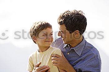 Similar – Image, Stock Photo Smiling little child with smart phone taking picture of happy grandmother and grandfather. Family leisure outdoor