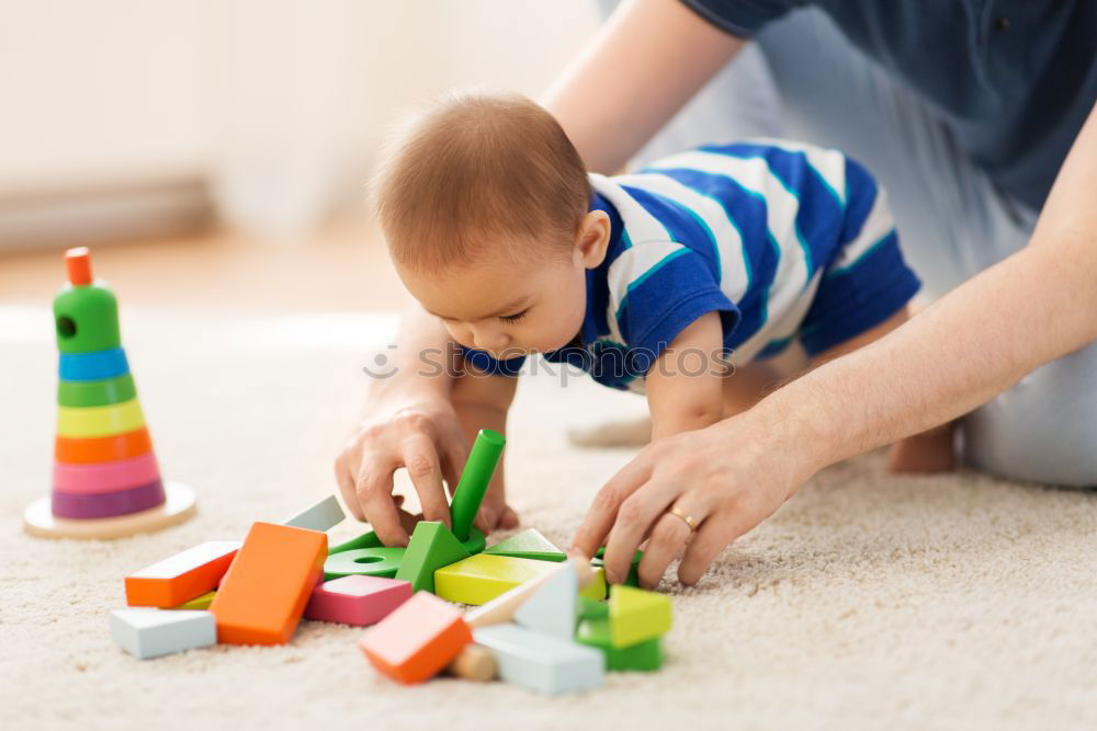 Similar – Image, Stock Photo Little child and father are drawing on a paper.