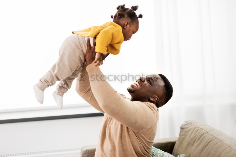 Similar – Portrait of African Father and toddler son