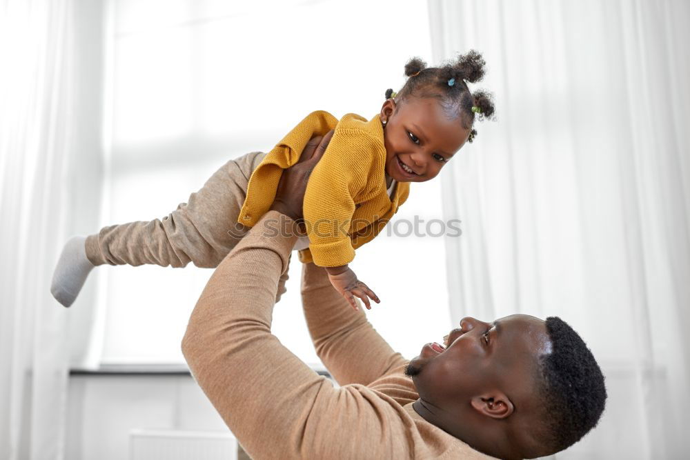 Similar – Portrait of African Father and toddler son