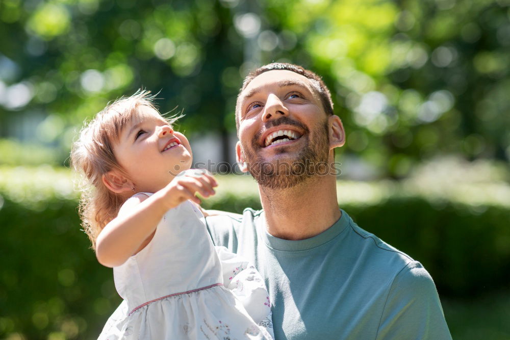 Similar – Image, Stock Photo Father and son playing at the park on bench at the day time.
