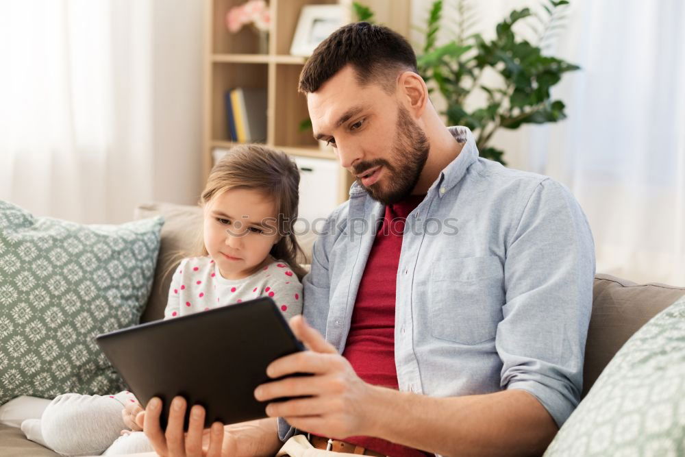 Similar – happy mother and toddler son using tablet