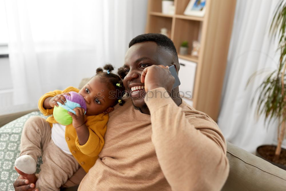 Similar – Portrait of African Father and toddler son