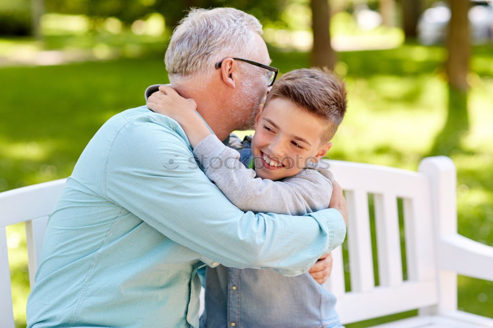 Similar – Boy kissing his grandmother