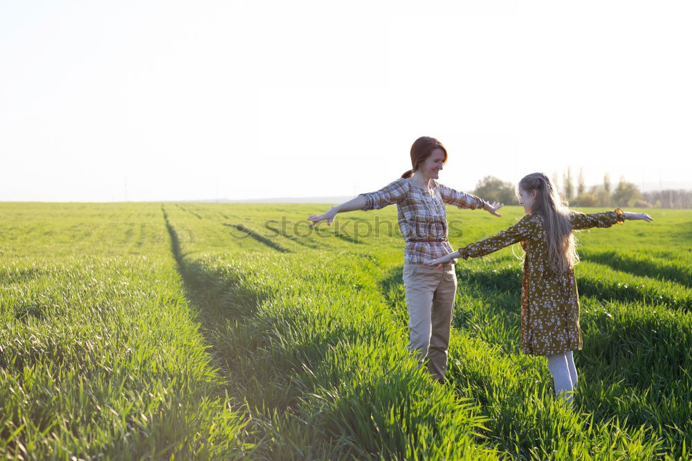 Similar – Mixed race couple having wine together on summer day