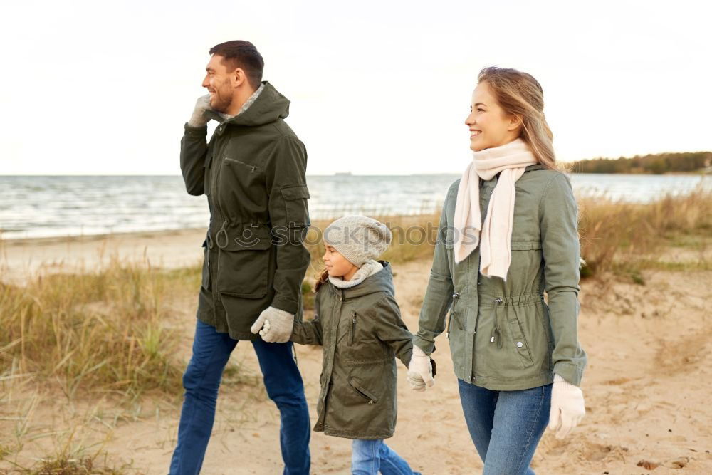 Similar – Image, Stock Photo Happy family walking together holding hands in the forest