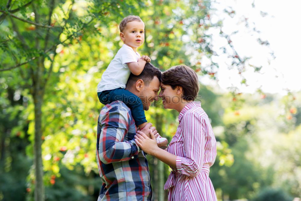 Similar – Image, Stock Photo Father and son playing at the park on bench at the day time.