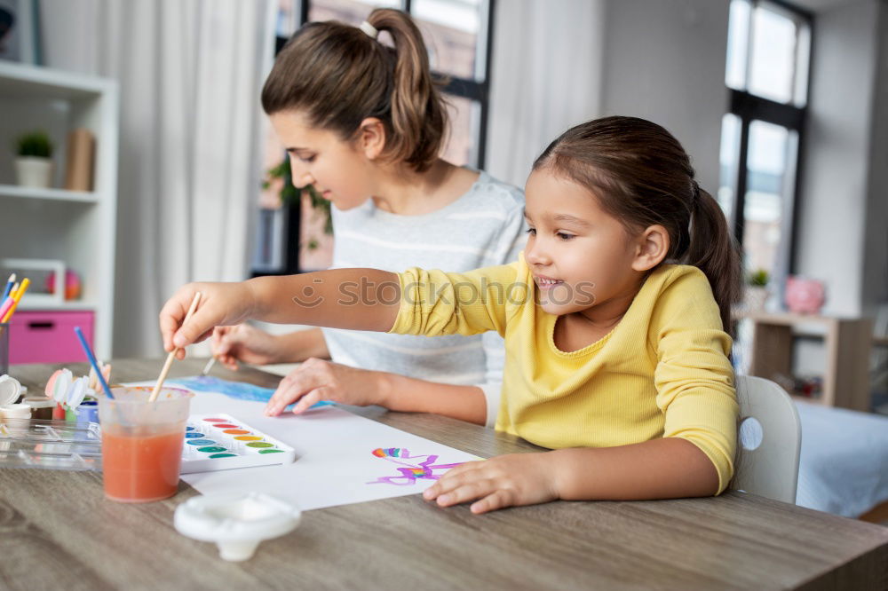 Similar – Image, Stock Photo Woman assembling furniture at home with Daughter