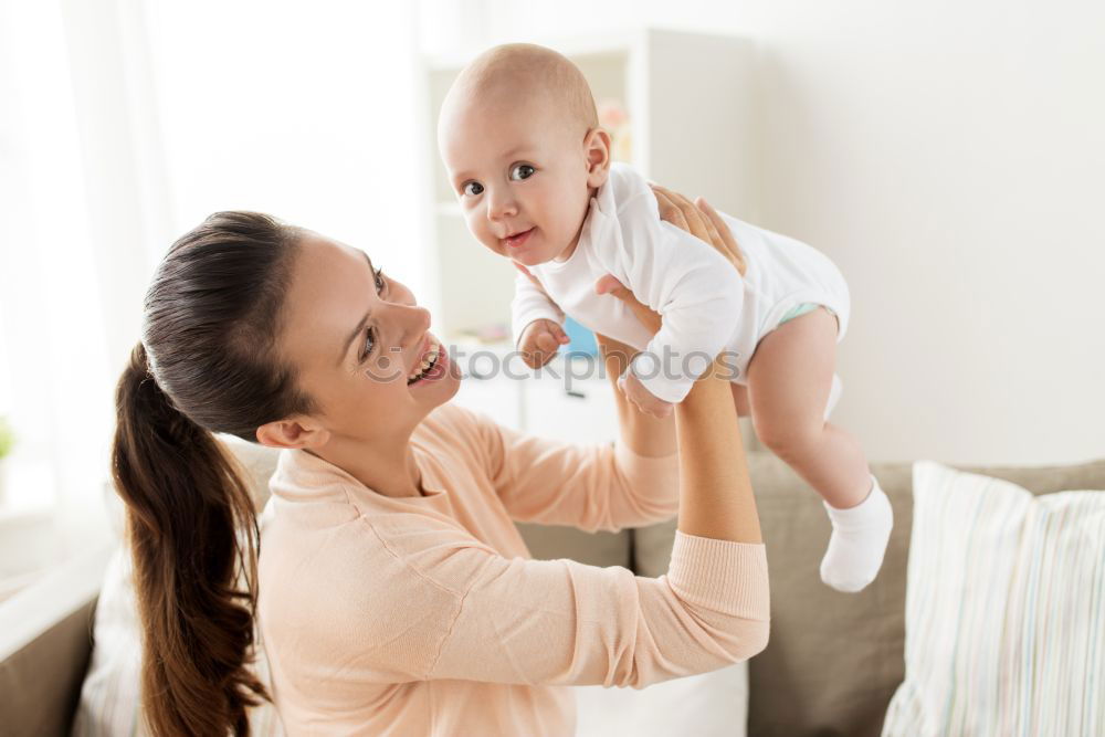 Similar – Image, Stock Photo portrait of a beautiful baby girl and her mother at home