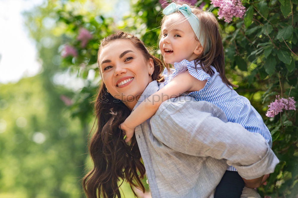 Similar – Image, Stock Photo Mom and daughter spending time in the park