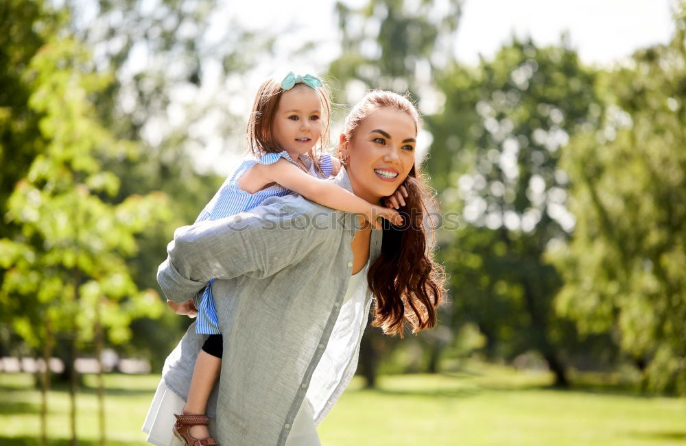 Image, Stock Photo Happy grandson hugging to his grandmother outdoors