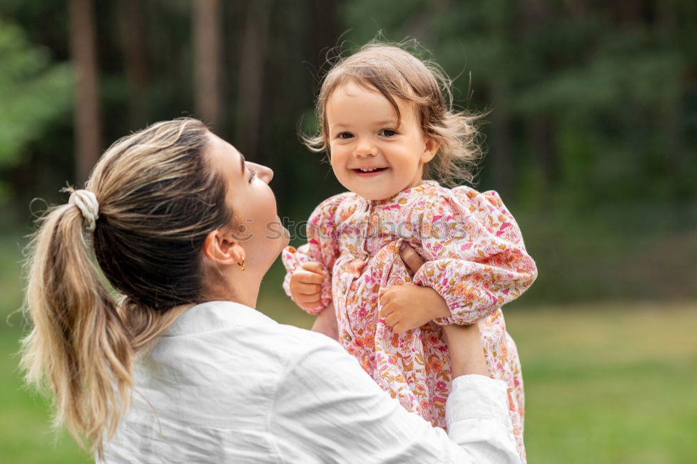 Similar – Happy lesbian couple with child