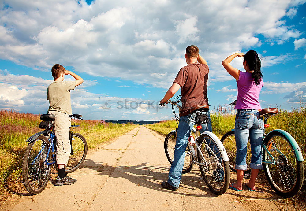 Similar – Image, Stock Photo Women on bikes giving high five