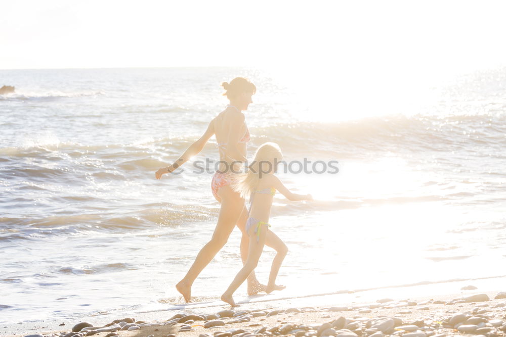 Similar – Image, Stock Photo Hipster friends cheering and dancing at beach party