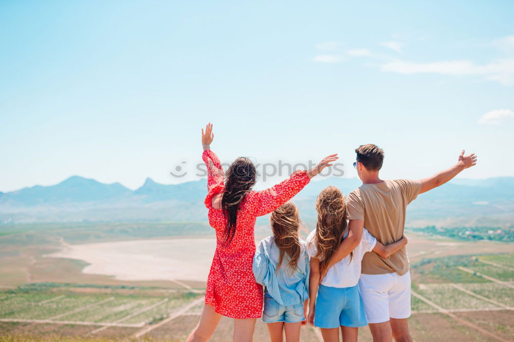 Similar – Image, Stock Photo Happy family standing near the lake at the day time.