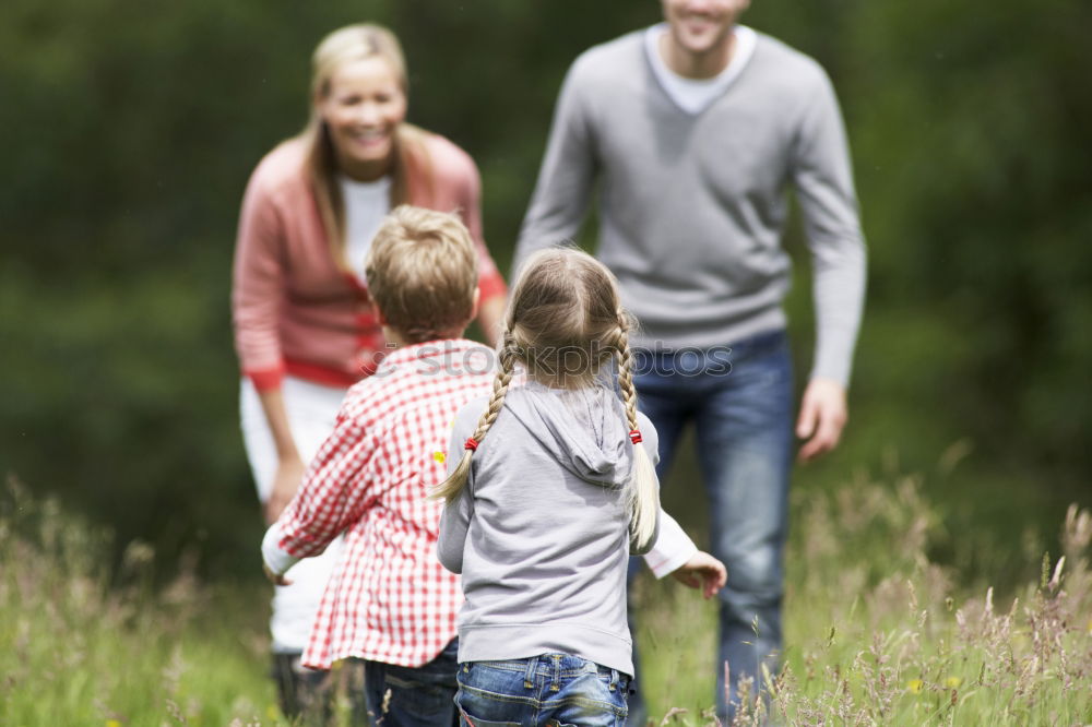 Image, Stock Photo Father and children walking on the road at the day time.