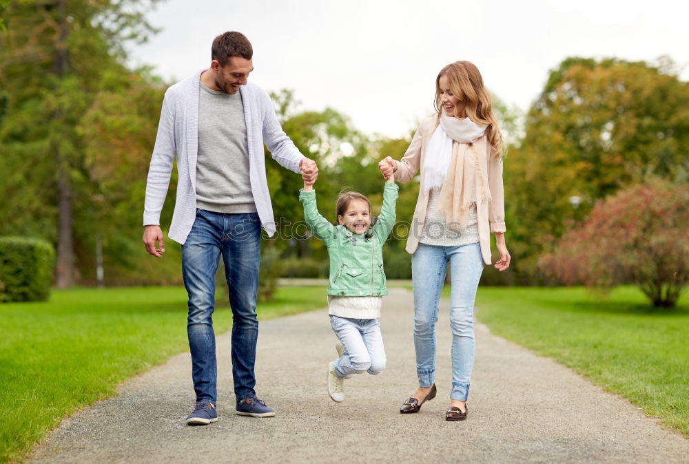 Similar – Image, Stock Photo Portrait of happy family enjoying together leisure over a wooden pathway into the forest