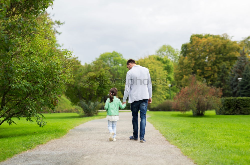 Similar – Couple taking a walk