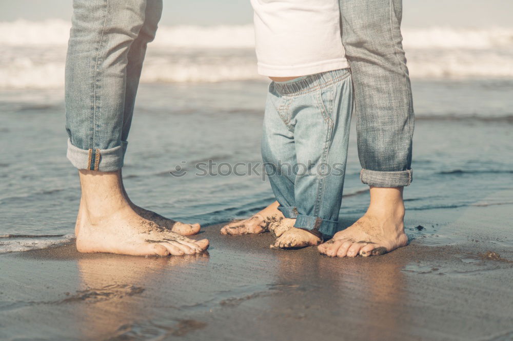 Similar – Image, Stock Photo Mother and son playing on the beach at the day time.