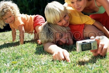 Similar – Image, Stock Photo Three happy children playing in the park at the day time.