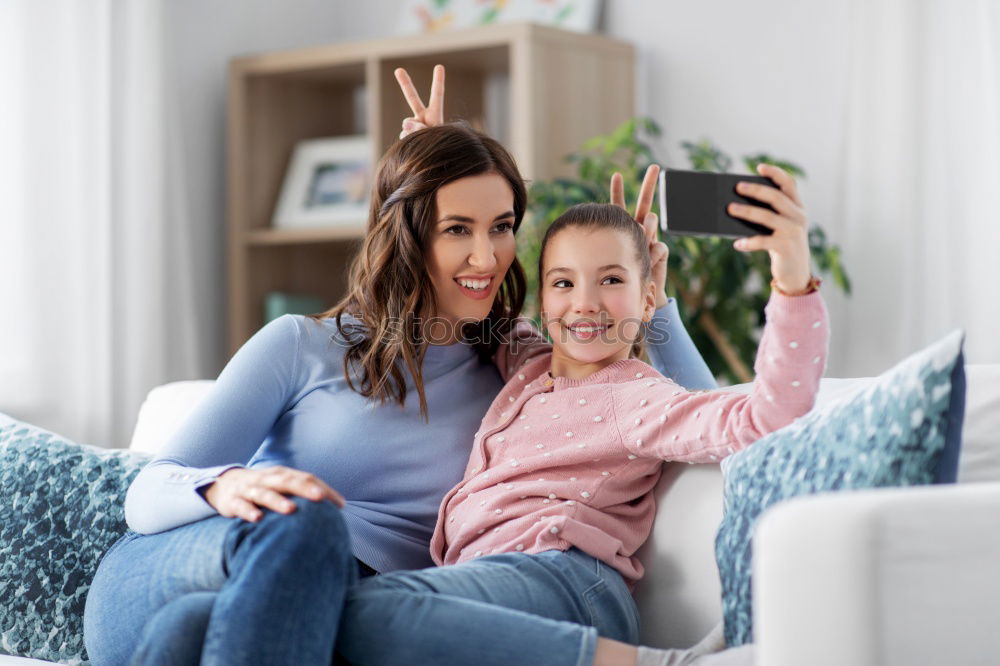 Similar – happy mother and toddler son using tablet