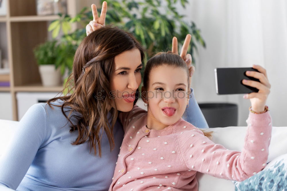 Similar – happy mother and toddler son using tablet