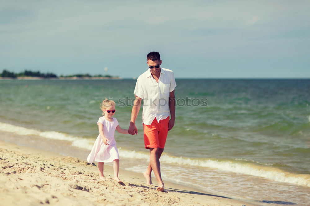 Similar – Image, Stock Photo Father and son playing on the beach at the day time. They are dressed in sailor’s vests and pirate costumes. Concept of happy game on vacation and friendly family.