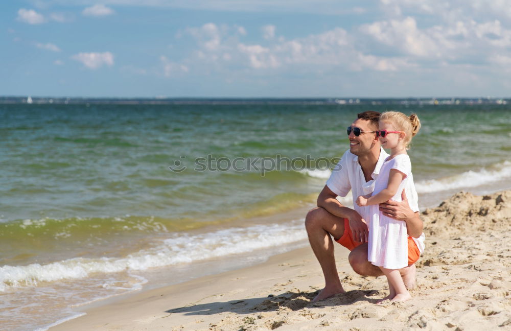 Similar – Image, Stock Photo Woman plays ball throwing with blond Labrador at Baltic Sea beach