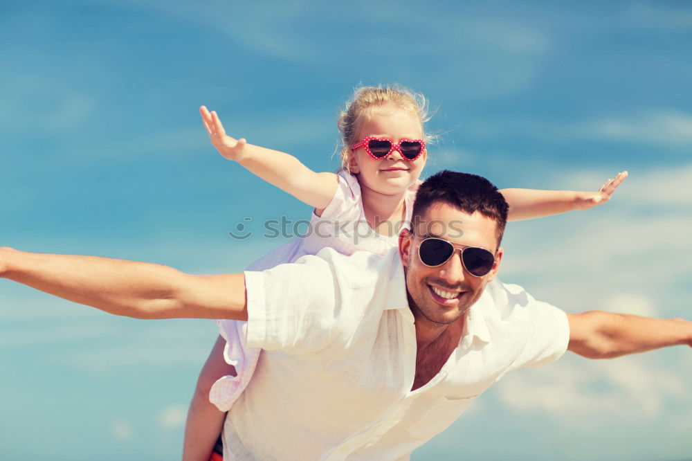 Similar – Father and son playing in the park at the day time.