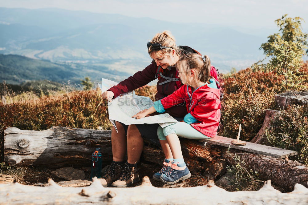 Similar – Image, Stock Photo Group of Hikers looking in map