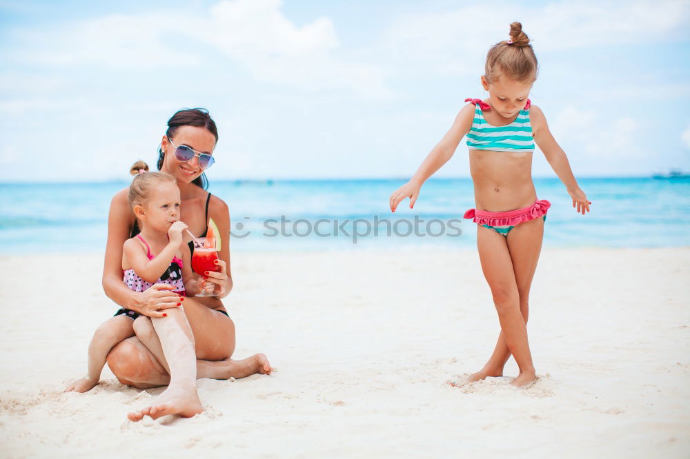 Similar – caucasian mother and son having fun at the beach