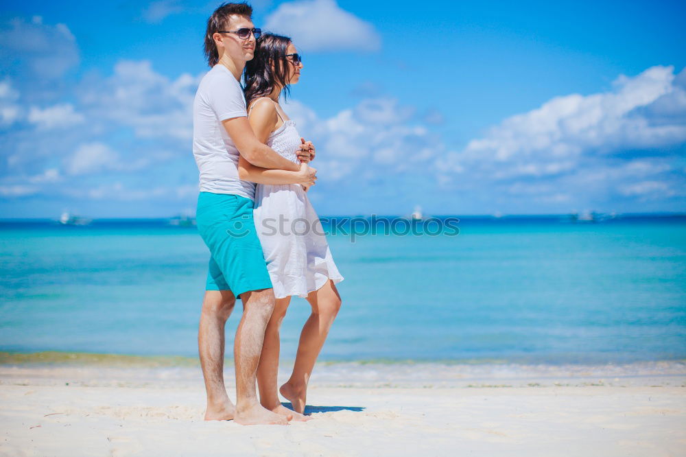 Similar – Image, Stock Photo Embracing loving couple on beach