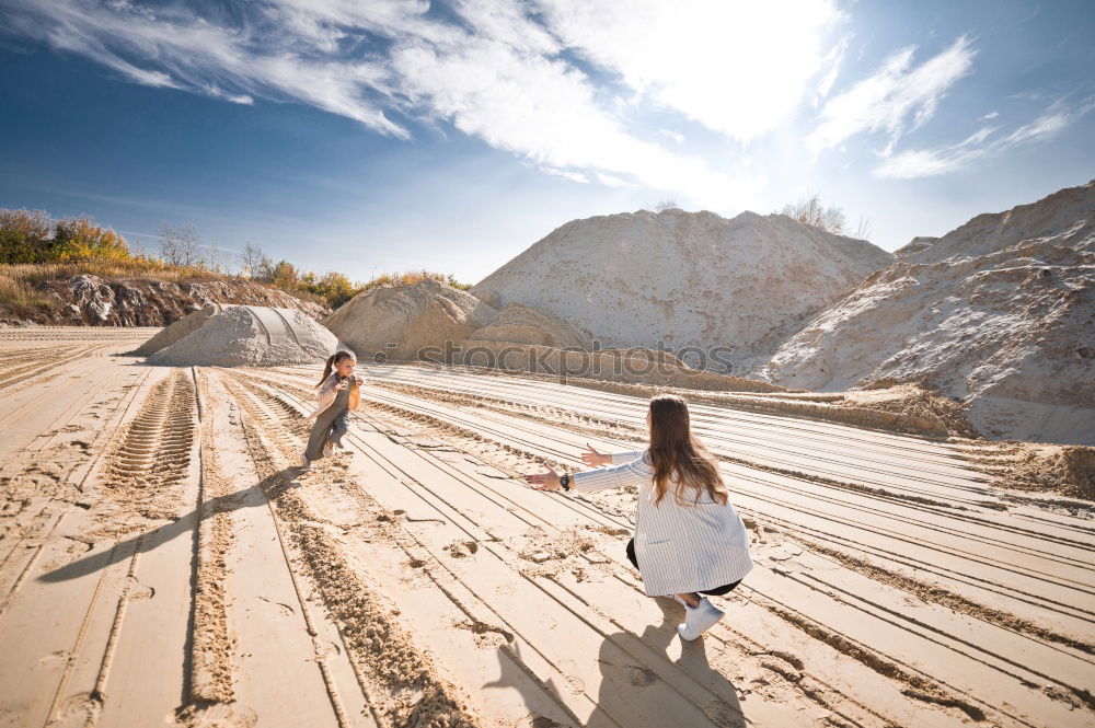 Similar – Image, Stock Photo Women walking on sandy hill