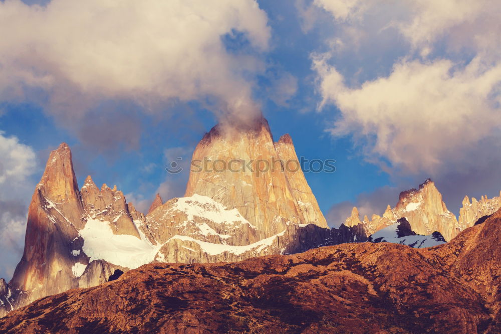 Similar – alpenglow, South Tyrol, snow, mountain peaks