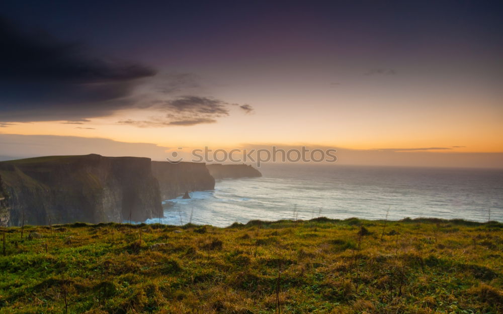 Similar – Cliffs of Moher at sunset