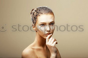 Similar – Image, Stock Photo Young woman with bald/very short hair stands naked on side in front of light green wall