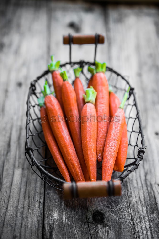 Similar – Sliced carrots on a chopping board