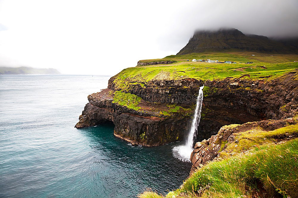 View of Mulafossur waterfall in Faroe Islands