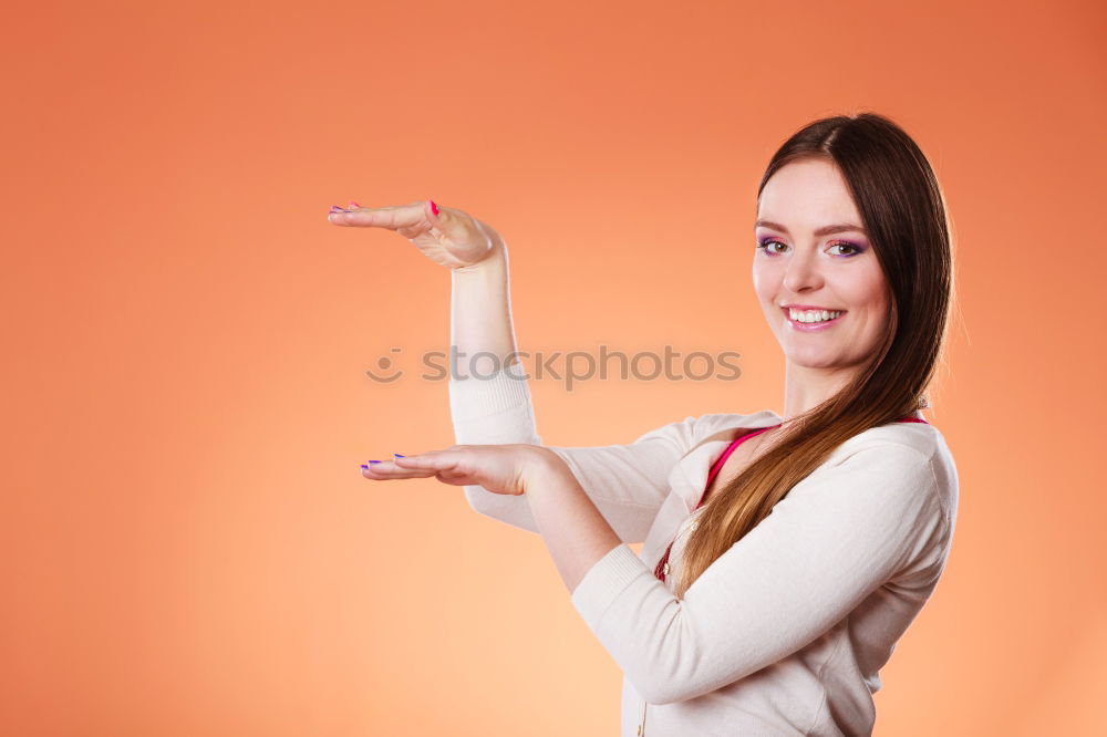 Similar – Image, Stock Photo Portrait of beautiful young woman using mobile phone in the street.