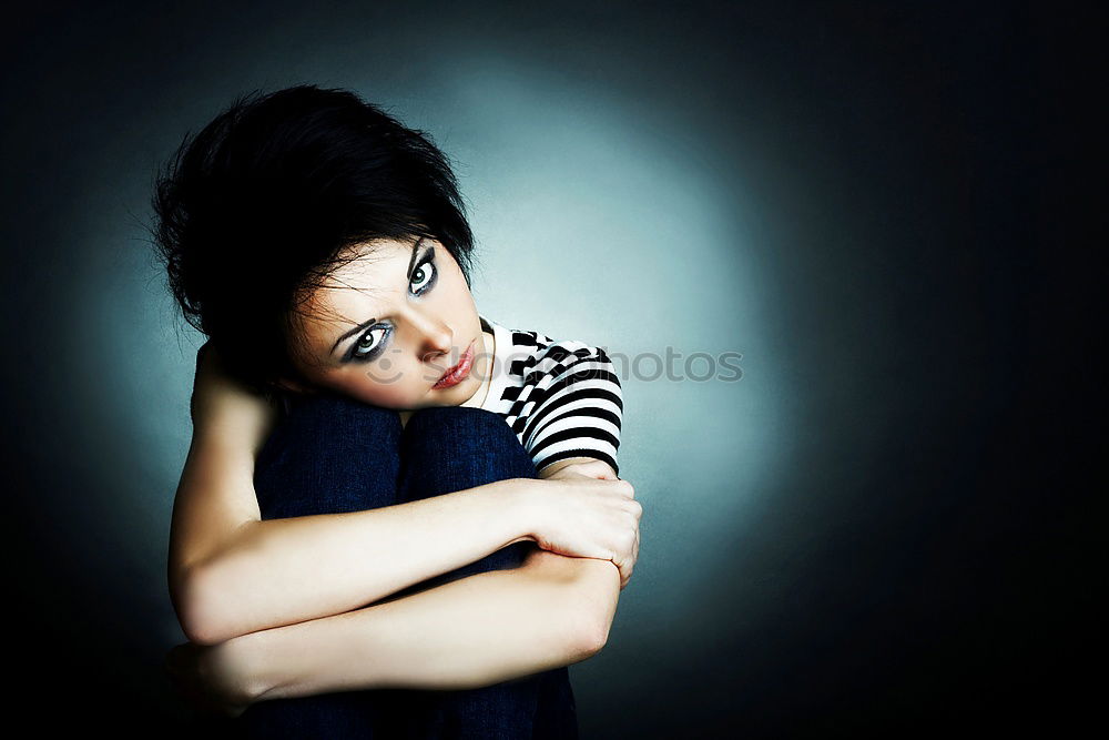 Similar – Young woman lying down in a sofa at home