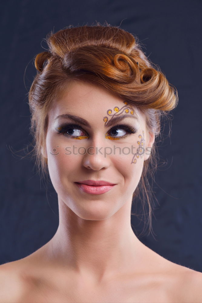 young woman with red hair and light eyes