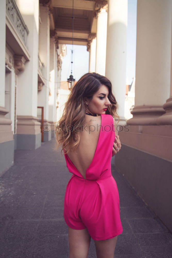 Beautiful young arabic woman with black curly hairstyle.